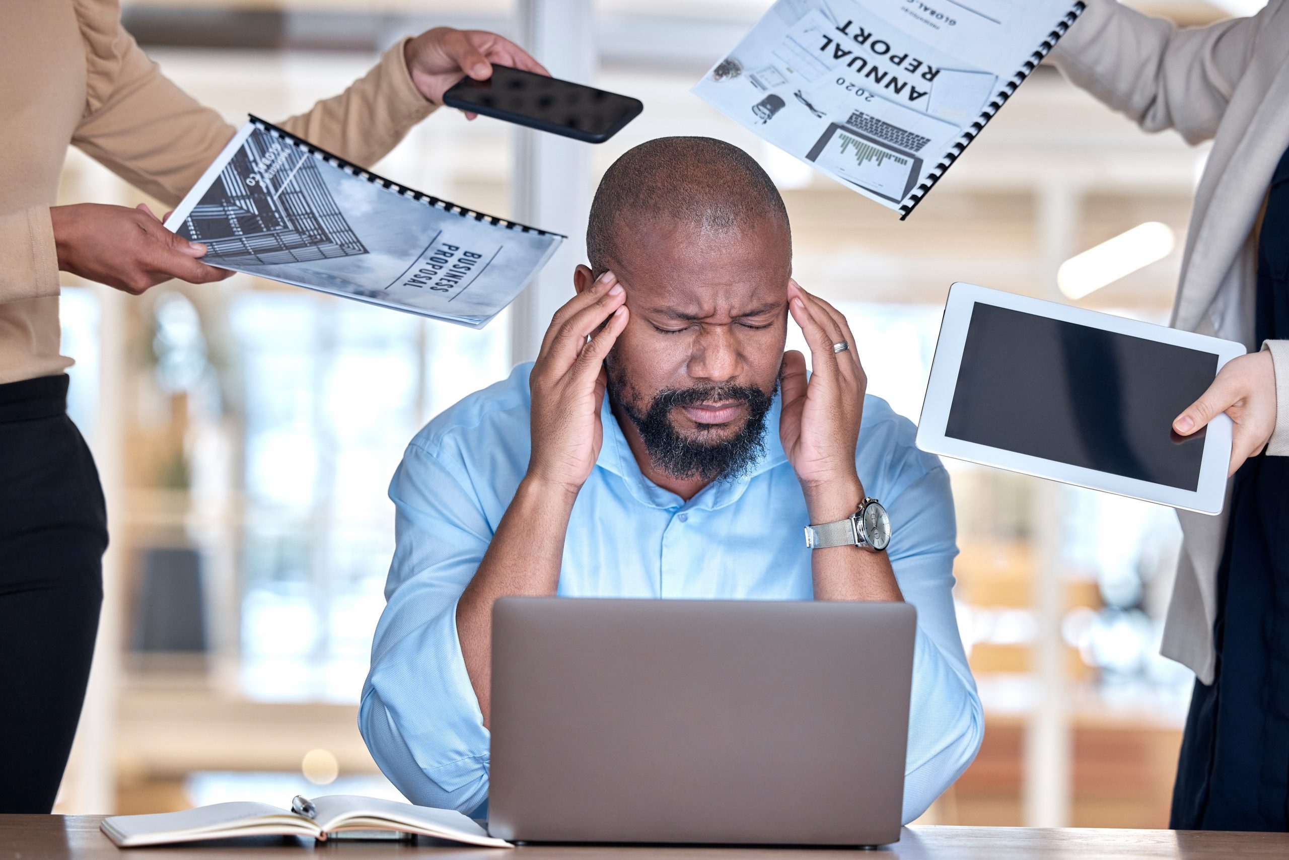 business-man-overwhelmed-and-stress-with-busy-han-2025-04-06-10-51-32-utc
